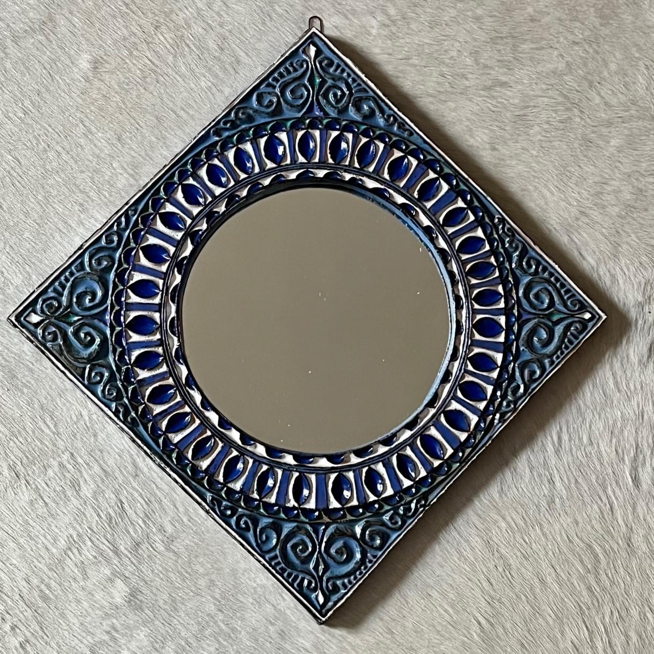 Ceramic mirror by Roland Zobel.  Ceramic mirror by Roland Zobel.