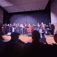 Cast of Burns and Allen and Gunsmoke in "Auld Lang Syne."