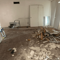 This is a before right after we started the demo and scraping popcorn off the ceilings