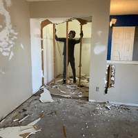 We removed the existing bi-fold door closed the wall and made the master closet much bigger