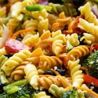 variety of colorful noodles with diced vegetables pasta salad