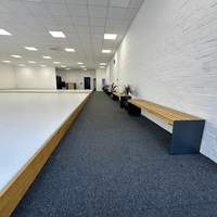 Comfortable seating area allowing parents and visitors to watch classes and training sessions.