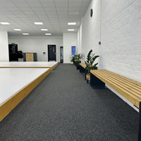 Comfortable seating area allowing parents and visitors to watch classes and training sessions.