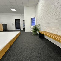 Comfortable seating area allowing parents and visitors to watch classes and training sessions.