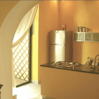 Kitchen, view 3, looking toward the door to the garden Kitchen, view 3, looking toward the door to the garden