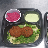 Vegan Kofta with dipping sauce and hummus Vegan Kofta with dipping sauce and hummus
