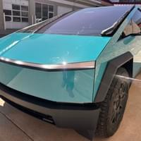Photo of Ross Blankenship with New Tesla Online