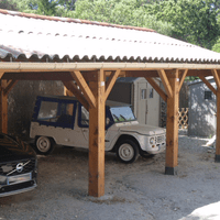 Vue du carport et cabanons pour vos bicyclettes Vue du carport et cabanons pour vos bicyclettes