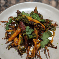 Harissa honey glazed carrots, chermoula, preserved lemon yogurt