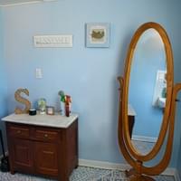Half bath vanity and mirror Half bath vanity and mirror