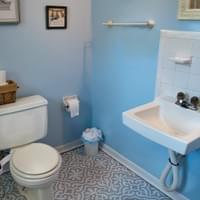 Half bathroom toilet and sink Half bathroom toilet and sink