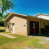 Detached garage and side yard Detached garage and side yard