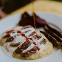 Steak on Polenta w/ Roasted Beets, Gorgonzola Cream, Sauce and Fresno Chile Oil