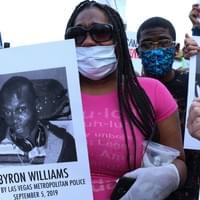Marcia Wells, niece of Byron Williams, joins other members of Families United 4 Justice Las Vegas - a local group of police brutality survivors and police homicide survivors - in downtown Las Vegas to protest the police murder of George Floyd.  Byron Williams was “cycling while Black,” when he was apprehended for allegedly not having  a safety light on his bicycle in the early morning of September 5, 2019.  Despite surrendering and being unarmed, the interaction caused him to lose his life.  May 30, 2020, Las Vegas, NV.  Photo by Nissa Tzun, Forced Trajectory Project. Marcia Wells, niece of Byron Williams, joins other members of Families United 4 Justice Las Vegas - a local group of police brutality survivors and police homicide survivors - in downtown Las Vegas to protest the police murder of George Floyd.  Byron Williams was “cycling while Black,” when he was apprehended for allegedly not having  a safety light on his bicycle in the early morning of September 5, 2019.  Despite surrendering and being unarmed, the interaction caused him to lose his life.  May 30, 2020, Las Vegas, NV.  Photo by Nissa Tzun, Forced Trajectory Project.