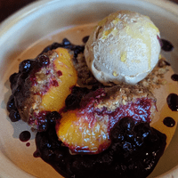 Baked peaches, fig leaf ice cream, huckleberries