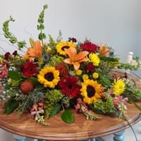 Bountiful Sunset Casket Spray $350 Bountiful Sunset Casket Spray $350