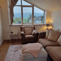 lounge, view over farm yard and beyond