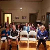 WCS HS Chorus getting ready to sing with the acapella group Backtrack at their concert