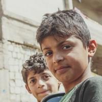 "We have been displaced from Cheikh Maksoud with my family because of the bombings and Al Nosra. We are living in a building carcass. We left our house because everything was very hard, one day a big mortar fell into the school where I was, I was very scared and we ran, and other mortars fell ... we ran to hide in the cellar of the school. Then a tank started shooting, the blows of the cannon were so strong and we were afraid that the cave might collapse on us. That was 4 years ago, I was 4 years old."
