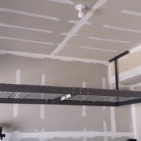 Installed Hanging Storage Rack in Garage Installed Hanging Storage Rack in Garage