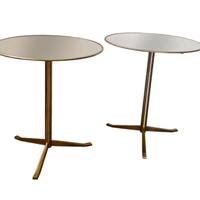 Pair of brass gueridons with stained mirror trays. Osvaldo Borsani, 1950. Pair of brass gueridons with stained mirror trays. Osvaldo Borsani, 1950.