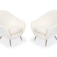 Pair of curved lounge chairs Pair of curved lounge chairs