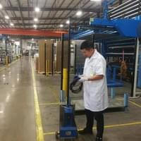 Slat Cleaner stands with his owner