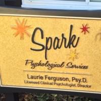Sign outside the building "Spark Psychological Services"