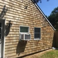 Restored painting and staining of wood shingles Restored painting and staining of wood shingles