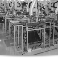 Soldering operation in a factory Soldering operation in a factory