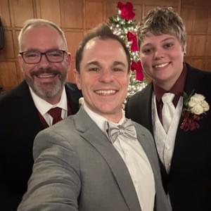 Schwa Potter with happy couple after personalized Wisconsin wedding ceremony