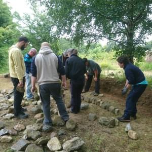 Building stone faced earth bank Building stone faced earth bank