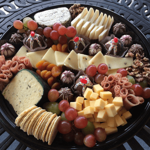 Cheese board with chocolate truffles