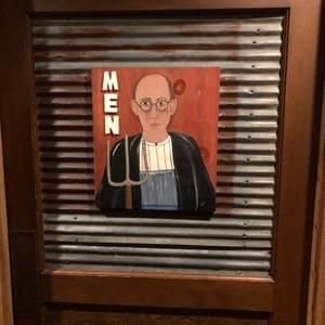 Men's Room Sign with farmer painted at theBarn