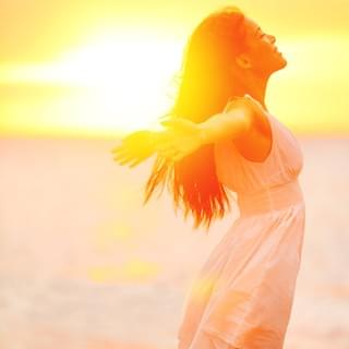 Image of joyous woman outside Image of joyous woman outside