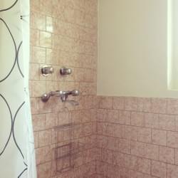 our bathrooms have strong hot showers and dry spots on the floor to stand after a shower ;P our bathrooms have strong hot showers and dry spots on the floor to stand after a shower ;P