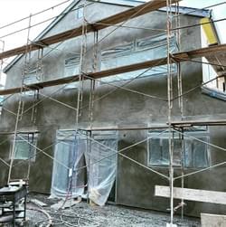 PLASTER PHASE IN CONSTRUCTION OF A 2,760 SQUARE FOOT, THREE-STORY RESIDENCE