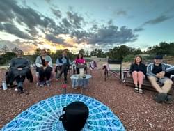 Enjoying the sunset before the moon rises.