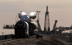 The Soyuz TMA-18 spaceship is transported by train to the launch pad at Baikonur cosmodrome in Kazakhstan, March 31, 2010. (REUTERS/Sergei Karpukhin)