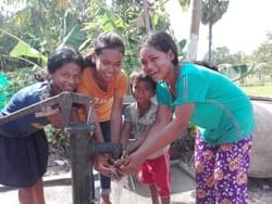 Cambodian family enjoying the water well generously donated by Mark & Trina Ramsey Foundation supporter George Ryon Cambodian family enjoying the water well generously donated by Mark & Trina Ramsey Foundation supporter George Ryon