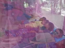 Cambodian children being protected by Mosquito Nets  donated by the Mark & Trina Ramsey Foundation Cambodian children being protected by Mosquito Nets  donated by the Mark & Trina Ramsey Foundation