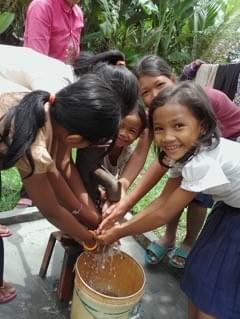 Cambodian children enjoying the Mark & Trina Ramsey Foundation water well marking the 15 year anniversary of Mark's mother Norma's passing Cambodian children enjoying the Mark & Trina Ramsey Foundation water well marking the 15 year anniversary of Mark's mother Norma's passing