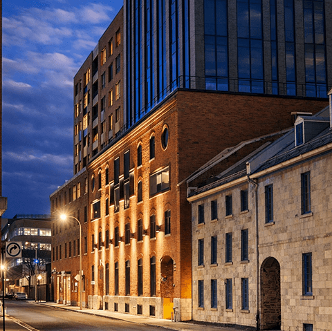 front view of 160 King Street building at night front view of 160 King Street building at night