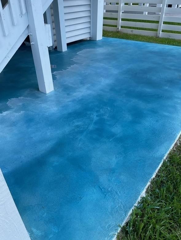 Decorative water colored concrete patio installed in Galveston Decorative water colored concrete patio installed in Galveston