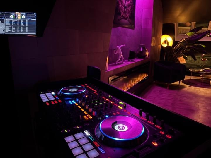 DJ booth with imac running Serato and an Pioneer Mixer DJ booth with imac running Serato and an Pioneer Mixer