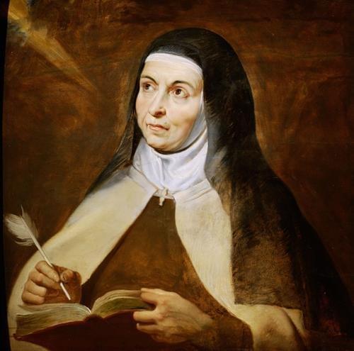 Saint Teresa of Aviila holding a quill pen and a book Saint Teresa of Aviila holding a quill pen and a book