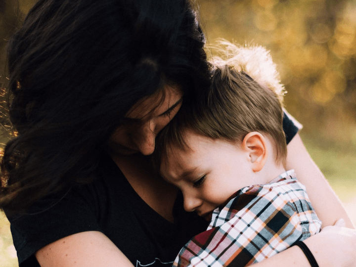 Picture of mother hugging child Picture of mother hugging child