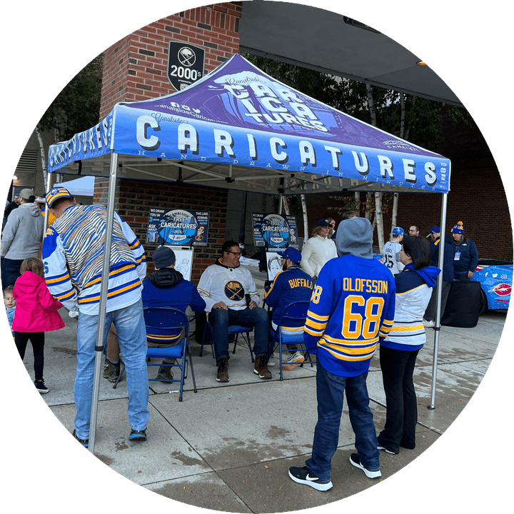 Artists drawing caricatures at a wedding at Babeville in Buffalo NY Artists drawing caricatures at a wedding at Babeville in Buffalo NY