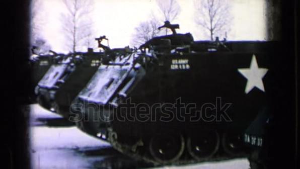 A retro clip of military armor tanks preparing for war. A retro clip of military armor tanks preparing for war.