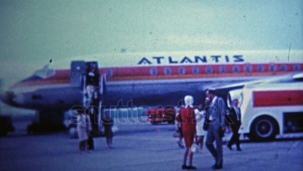 A retro clip of an airplane waiting for passengers. A retro clip of an airplane waiting for passengers.